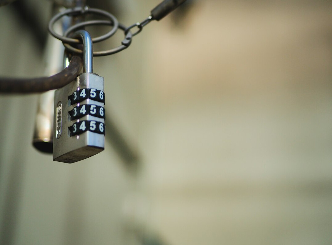 Padlock on a keyboard representing cybersecurity
