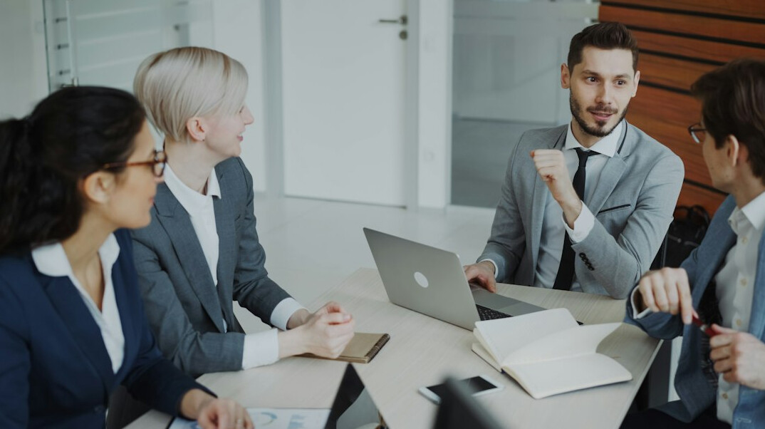 business team discussing software